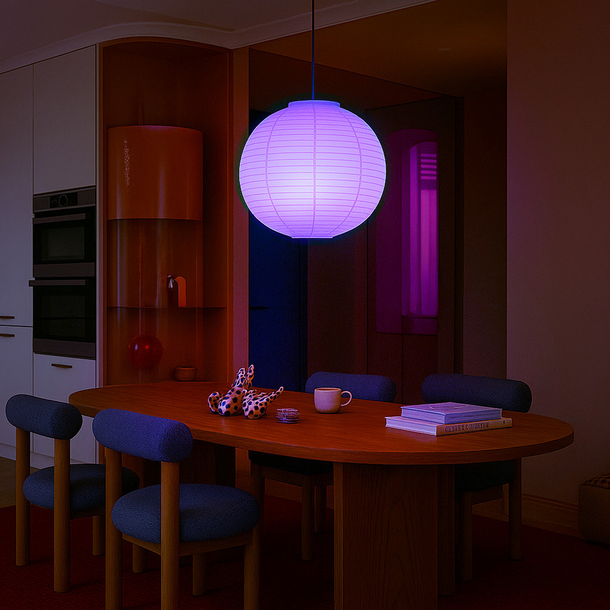 Dining area with a round table and chairs under a pendant light lit purple with a LIFX Color Changing Smart Bulb.